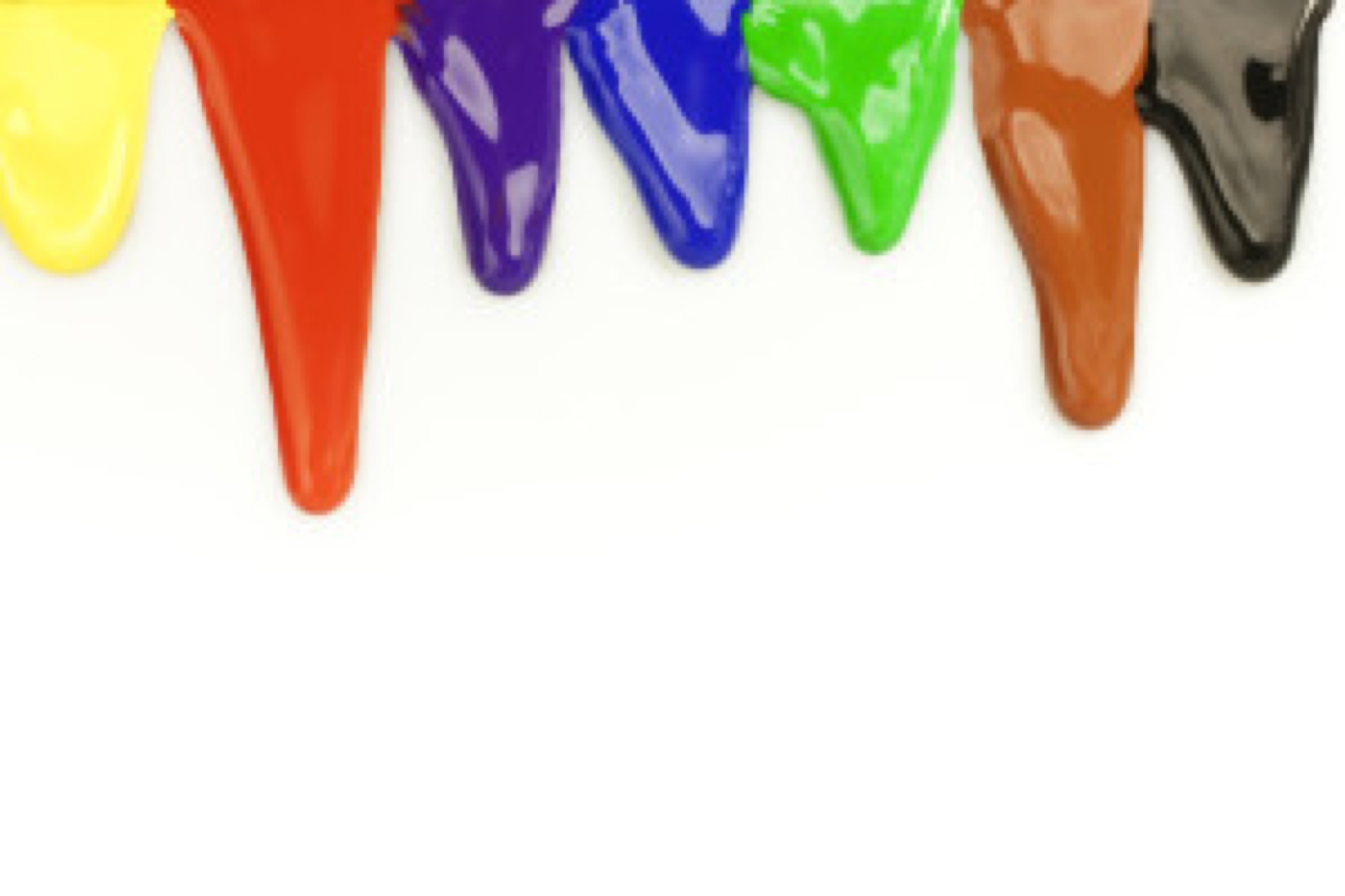 different colors dripping from a white surface