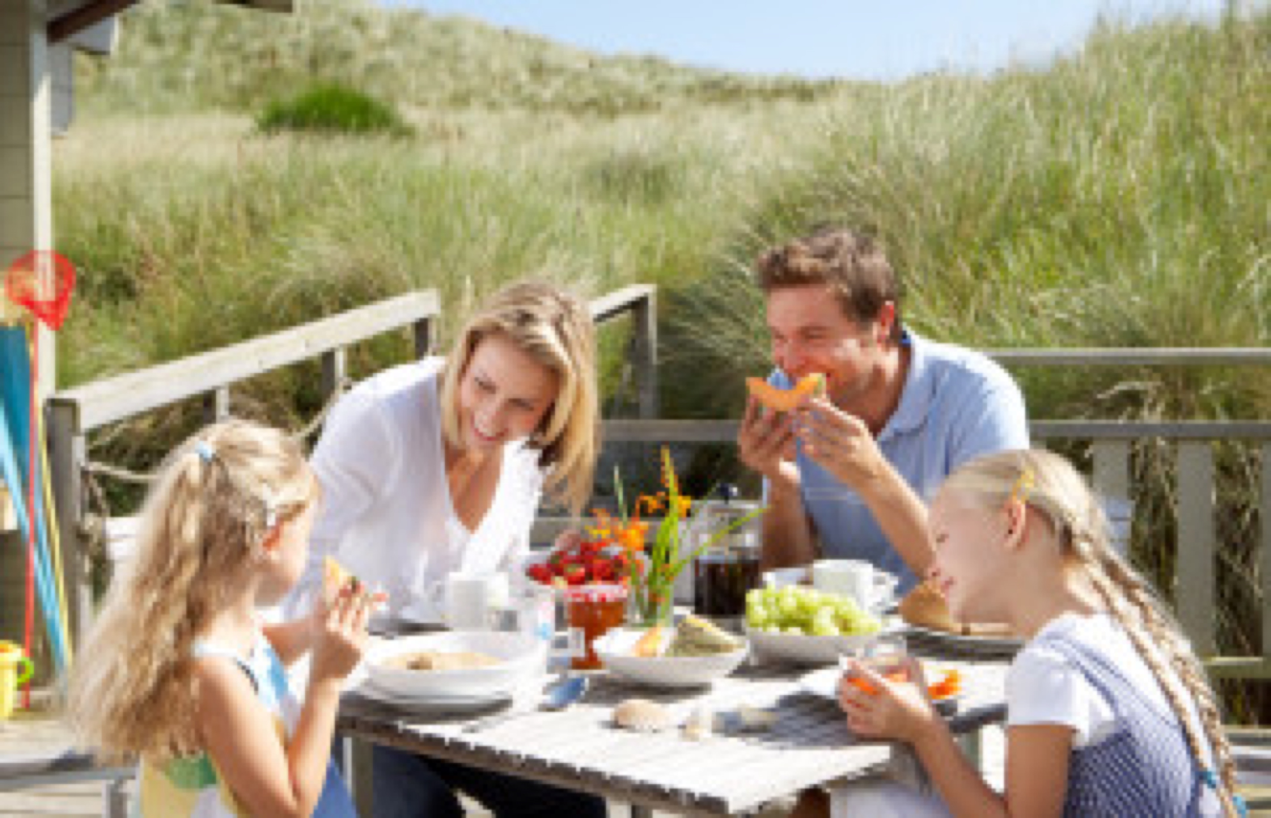 Family on vacation eating outdoors